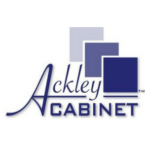 Logo of ackley cabinet featuring stylized text "ackley cabinet" in navy blue with a graphic of three overlapping squares in shades of gray and blue above the text.